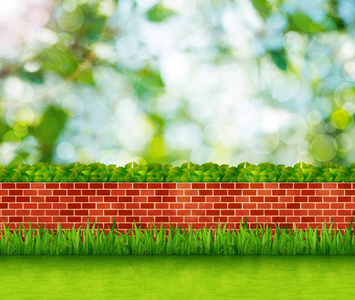 砖墙与绿草的花园背景