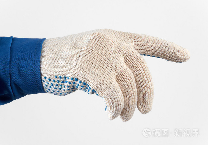 工人的手中拿着的东西的防护手套