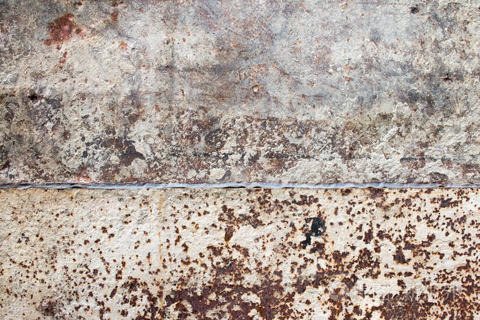 详细的照片纹理的锈老白漆金属墙。废旧金属钢铁防锈纹理的背景。Grunge 生锈金属表面纹理