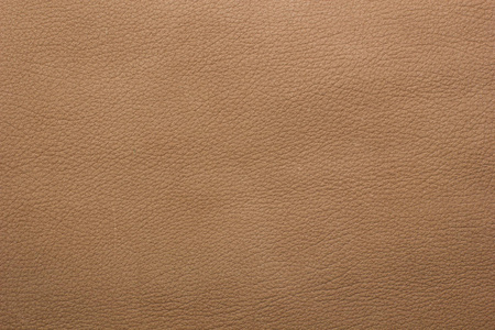 淡棕色皮革背景照片