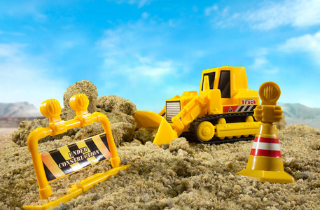 玩具推土机和金钱图片