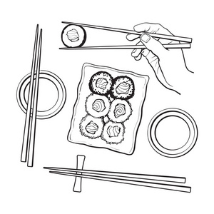 日本寿司套，菜盘，手拿着筷子