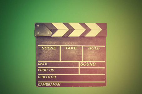 在绿色的拍摄，电影 clapperboard。