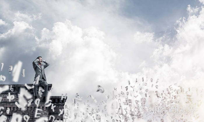 失意的商人坐在屋顶上
