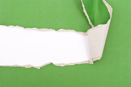 绿色撕裂的纸照片