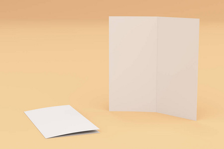 空白的白色两折小册子样机上橙色背景