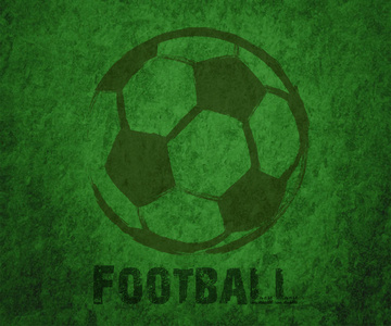 在绿色的背景上绘制的抽象足球球