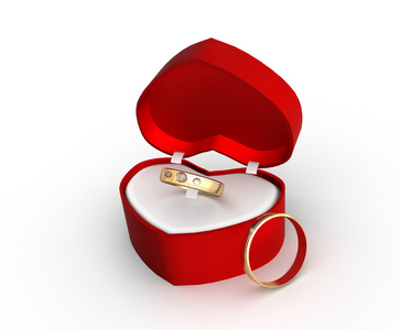 在白色背景的礼品盒中的结婚戒指