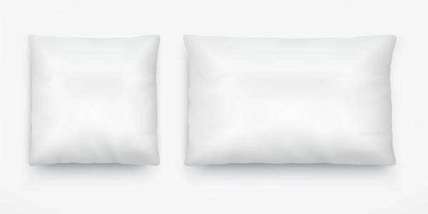 方形和长方形的白色枕头布局图片