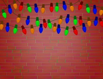 红砖墙上的彩色圣诞灯泡