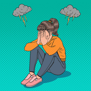 流行艺术使坐在地板上的年轻女孩心烦意乱.郁闷的哭泣的女人.