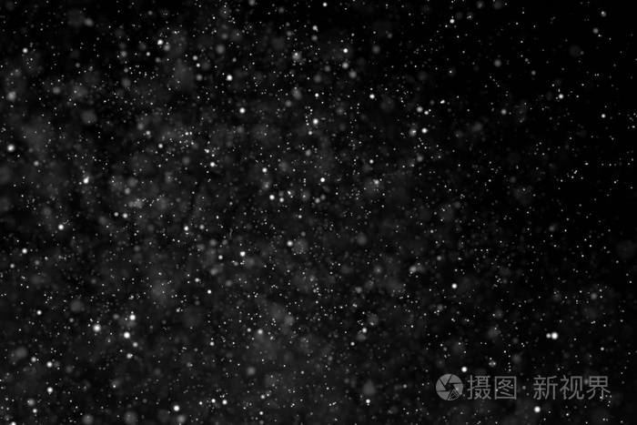 在暗背景上与光 sp 一起流动的尘粒