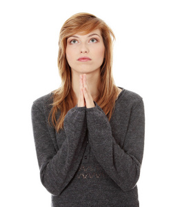 祈祷的年轻白种女人