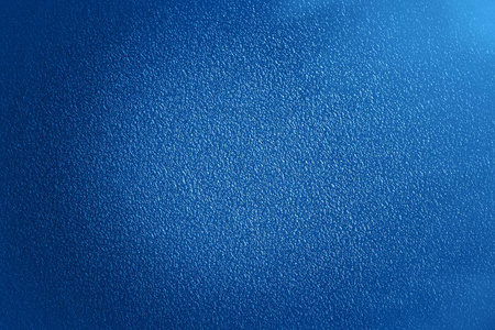 蓝色塑料材料无缝背景和纹理照片