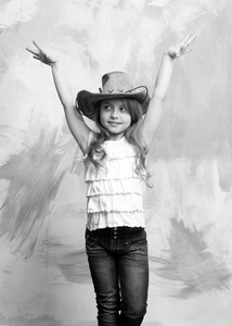 孩子或牛仔帽的小快乐微笑女孩