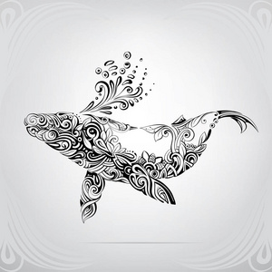 鲸鱼的剪影在装饰样式照片