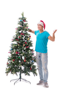 装饰圣诞树上白色孤立的年轻人