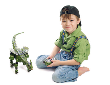 年轻男孩玩恐龙