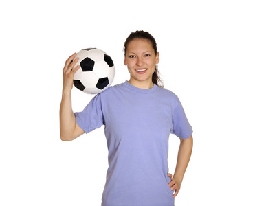 年轻女子带着足球