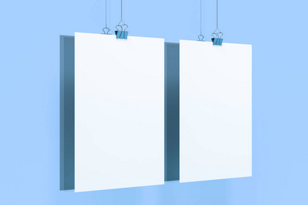 两个空白的白色海报与活页夹在蓝色 backgrou 样机