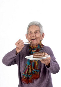 老妇人吃一块蛋糕