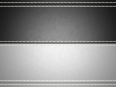 黑色和灰色的横向缝合的皮革背景照片