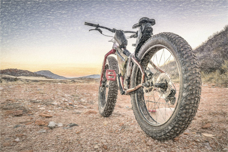 沙漠山地小路上的胖自行车图片