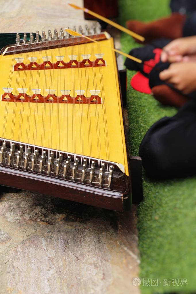 儿童演奏扬琴, 泰国