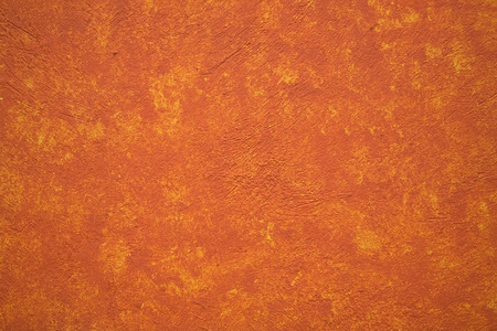 明亮的橙色黄色土坯墙墨西哥