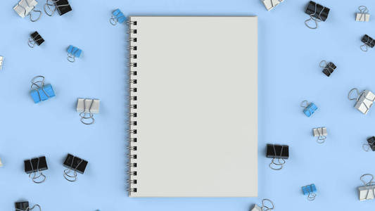 带黑色,白色和蓝色活页夹的空白螺旋笔记本照片