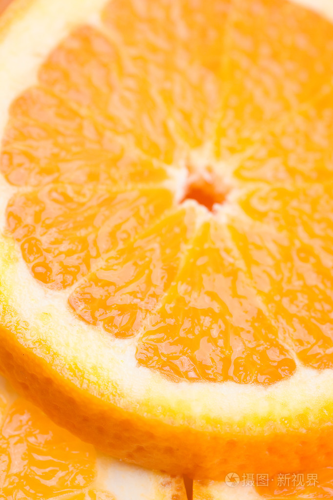Background of cloves sliced oranges