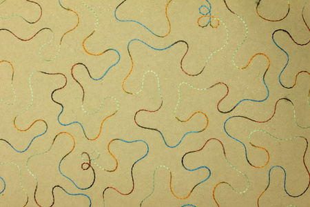 米黄色手工艺术纸,线纹图案照片