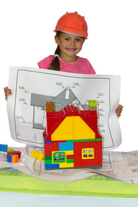 可爱的女孩橙色头盔与房子项目