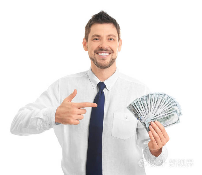 英俊的年轻生意人以金钱在白色背景