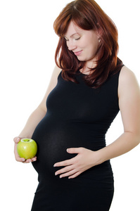 怀着苹果的孕妇