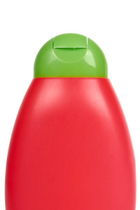 白色背景的洗发水的红色塑料瓶。Hydiene 和清洁理念