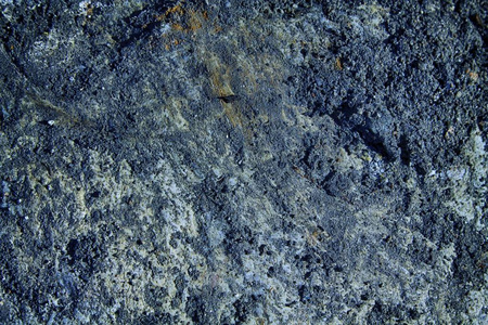 蓝色花岗岩岩石特写背景, 石头纹理, 破裂的表面