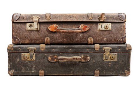 孤立在白色背景上的旧行李箱照片