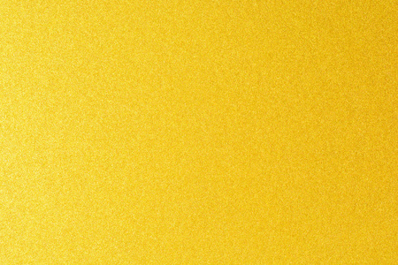 金色的彩漆墙.奢华的金色背景和墙纸.金箔纸或包装纸照片