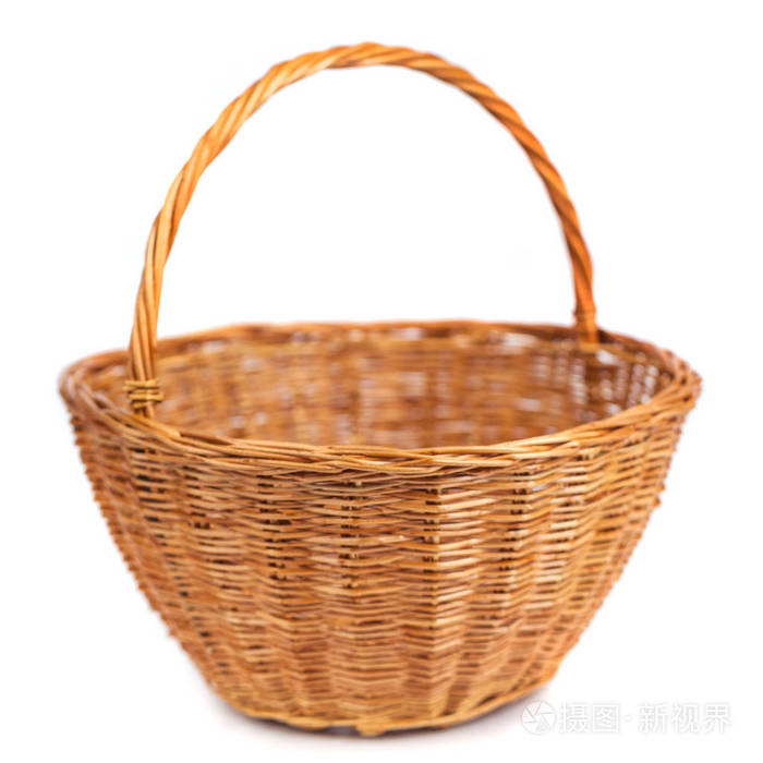 空的柳条篮子为果子和蔬菜隔绝在白色