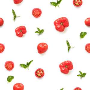 白色背景的新鲜西红柿和绿罗勒的无缝模式, 顶部视图