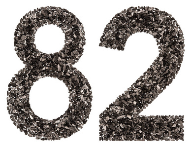 八十二阿拉伯数字 82, 八十二, 从黑色的天然木炭, 是照片