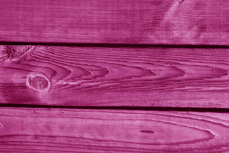 粉红色色调的木质墙壁图片