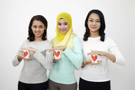 三多种族马来西亚持有杯的爱看相机