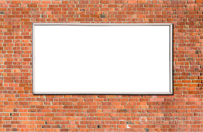 在砖墙上的空白广告牌