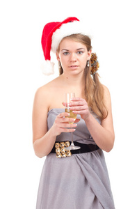 女孩庆祝圣诞节与一杯红酒
