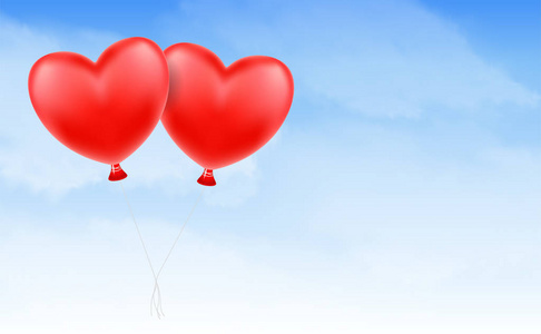 两颗爱的心气球漂浮在蓝天图片