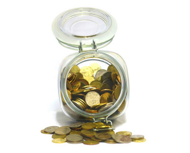 储蓄基金概念与硬币一个玻璃罐子