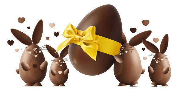 巧克力复活节兔子与鸡蛋和金色丝带弓孤立