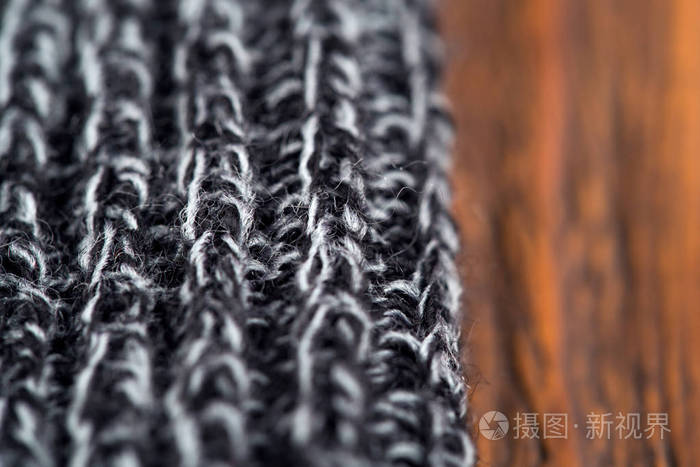 灰色针织羊毛制品, 靠近木质背景